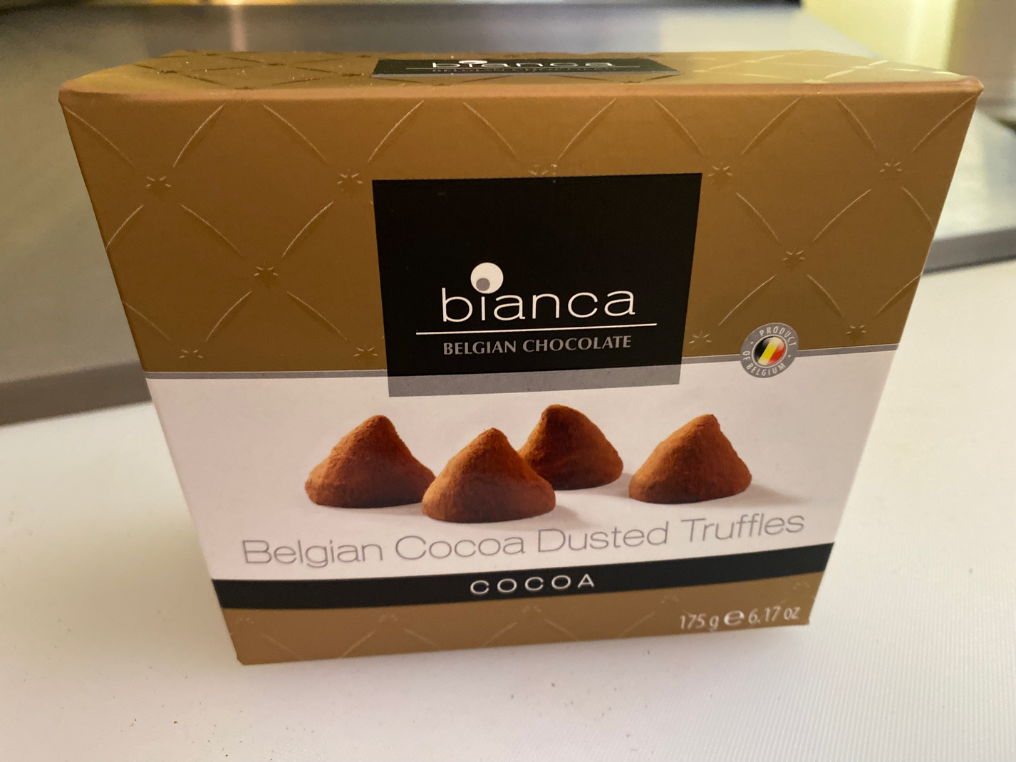 Bianca Belgian Cocoa and Orange Dusted Truffles Thepetitparis.ca